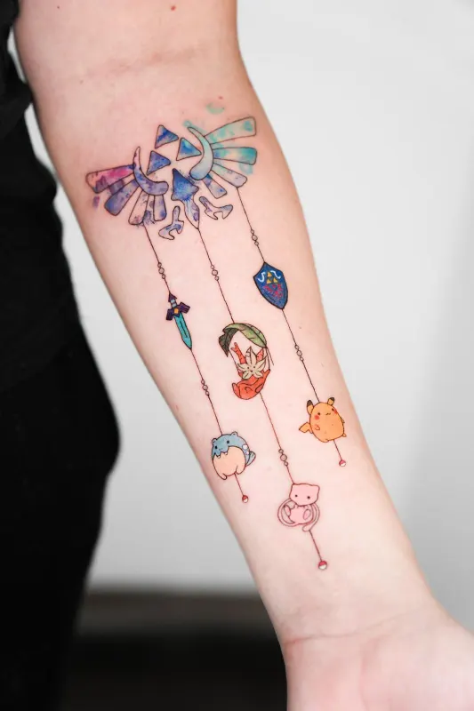 Color Tattoo von Chibi — Zelda Triforce mit Pokemon in Pastell-Farben, Memorink Heilbronn