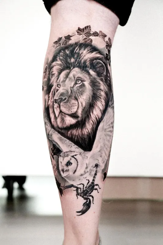 Realism Tattoo von Chibi — Loewe, Eule und Skorpion am Bein, Memorink Heilbronn